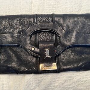 LAMB by Gwen Stefani, black leather fold over clutch with bag